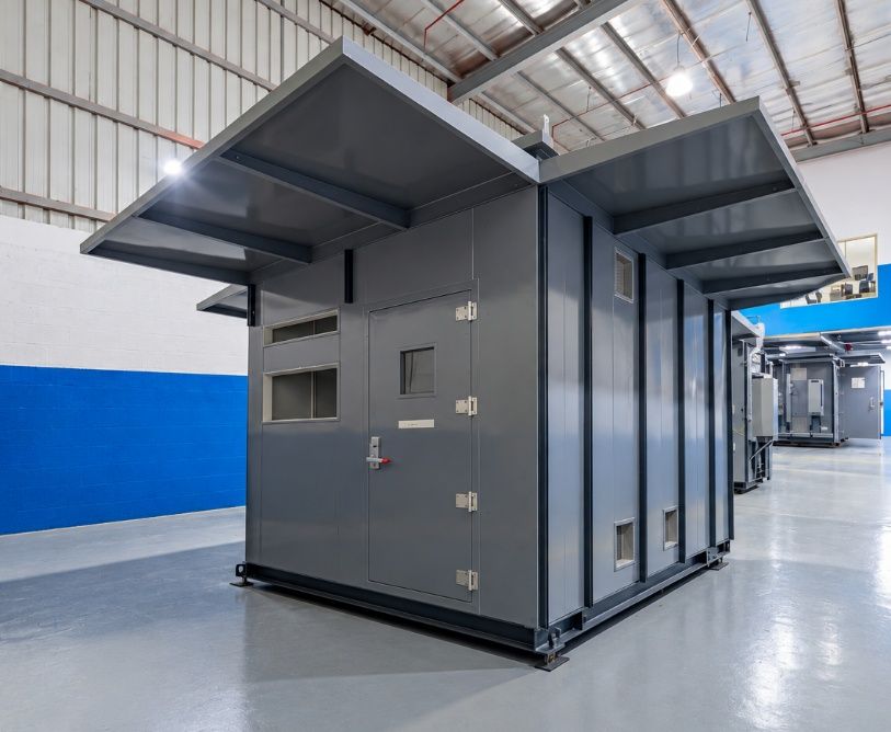 Analyzer shelter with external sample panels under fabrication in the AIC workshop